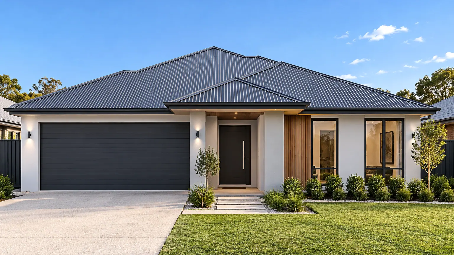 A single storey home with a corrugated hip roof and a gable over the entry, its roof shown in the colour you pick